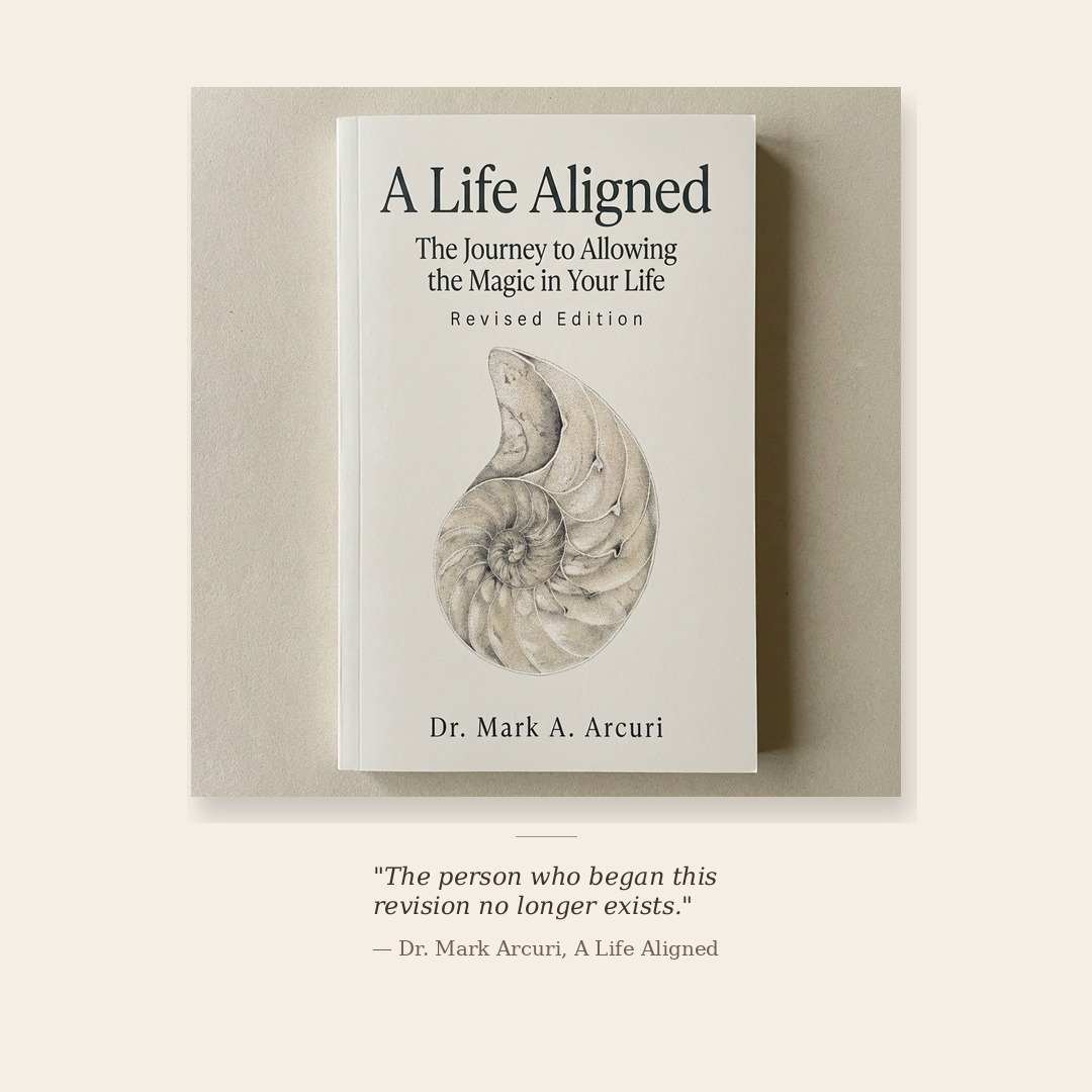 Cover of the revised edition of A Life Aligned by Dr. Mark A. Arcuri, featuring a nautilus spiral illustration. Revising A Life Aligned after twenty years became its own crucible of transformation.