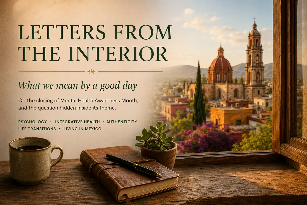 A leather journal and ceramic coffee mug rest on a wooden windowsill in Querétaro, México, overlooking the domes and bell towers of a historic church — a reflection on what a good day looks like in your own particular life.